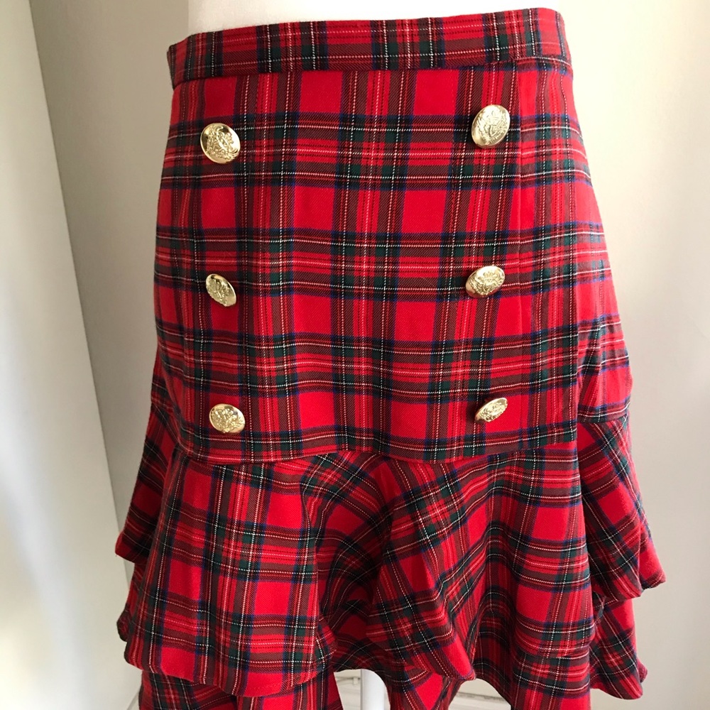 Venus red plaid ruffle skirt with gold buttons.